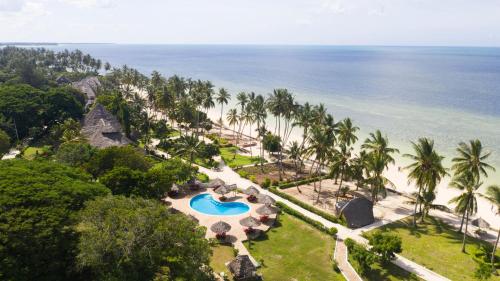 an aerial view of the beach and the ocean at Antonio Beach Tree House Hotel & Spa in Uroa