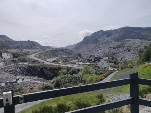 a view of a road in the mountains at Llechwedd Glamping in Blaenau-Ffestiniog