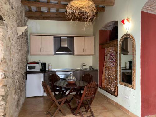 Kuchyň nebo kuchyňský kout v ubytování La Casita de la Muralla