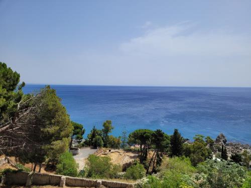 a view of the ocean from a hill at Casa Cobalto - Lascio tutto vivo a Copanello in Copanello