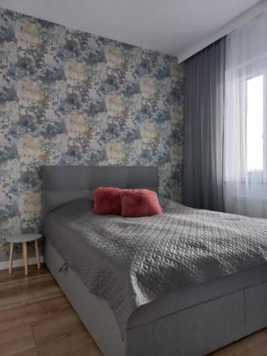 Posteľ alebo postele v izbe v ubytovaní Apartamenty Termalne na Długiej 6