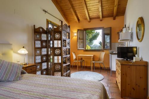 Ένα ή περισσότερα κρεβάτια σε δωμάτιο στο Casa Sarasa