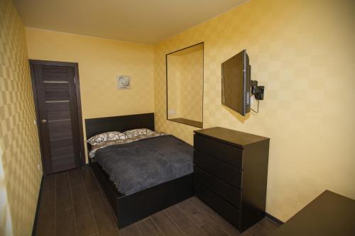 Postel nebo postele na pokoji v ubytování Meretskova Apartment