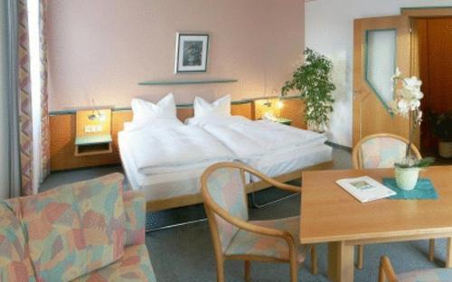 Ένα ή περισσότερα κρεβάτια σε δωμάτιο στο Hotel Marko