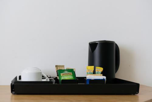 Plana Hotelにあるコーヒーまたはお茶
