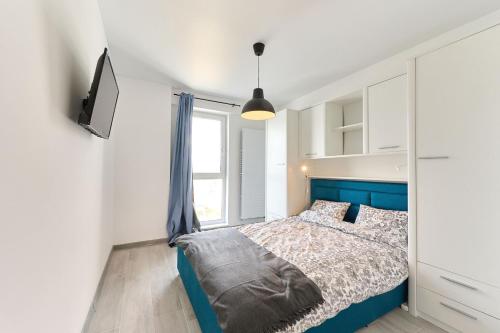 Un pat sau paturi într-o cameră la Apartament Andrei in Nord10 - pool n playground