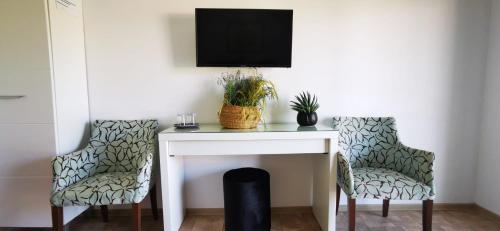 TV a/nebo společenská místnost v ubytování Wait`N Sea House