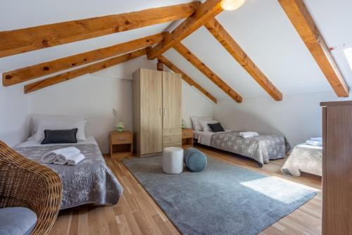 Postel nebo postele na pokoji v ubytování House Nevenka