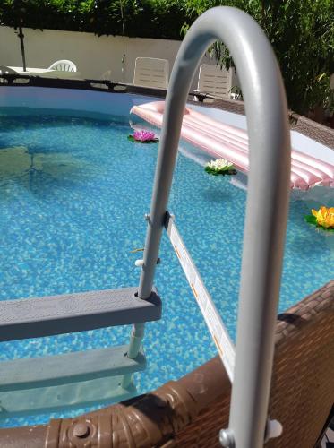 a water slide in a swimming pool at Il nido in Cecina