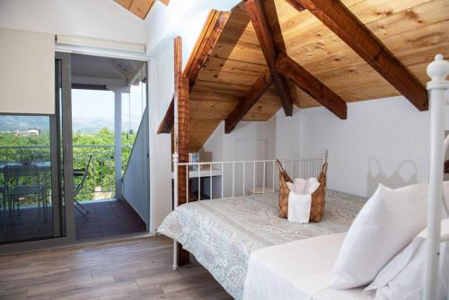 Ένα ή περισσότερα κρεβάτια σε δωμάτιο στο Countryside Loft - Inachos