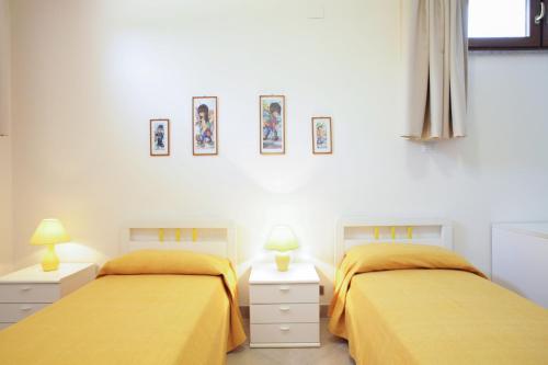 Katil atau katil-katil dalam bilik di Villa Marivessus