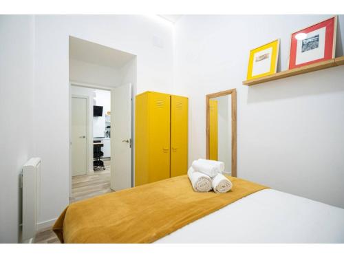Apartamento amarillo en Atocha