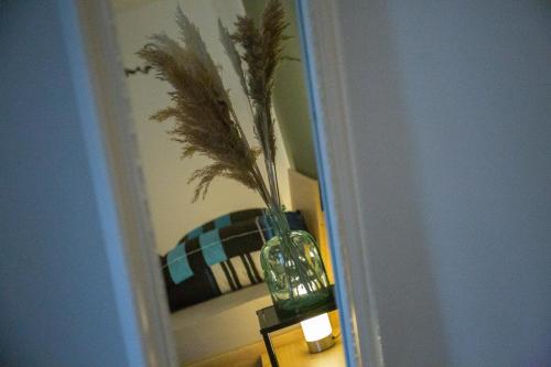 Postel nebo postele na pokoji v ubytování Ferienwohnung mitten in Saarburg