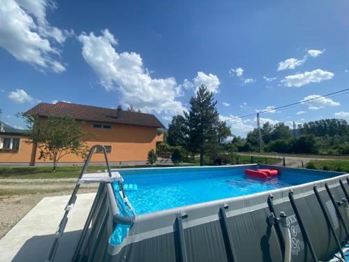 Piscina a Vila Una 1 o a prop