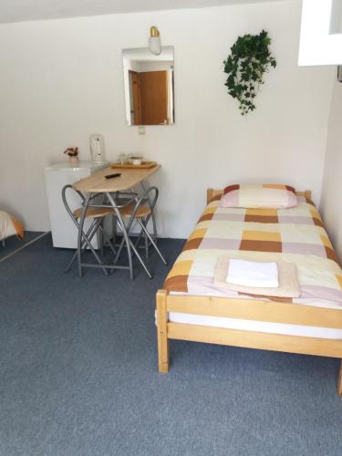 Postel nebo postele na pokoji v ubytování Apartments Family Trauber