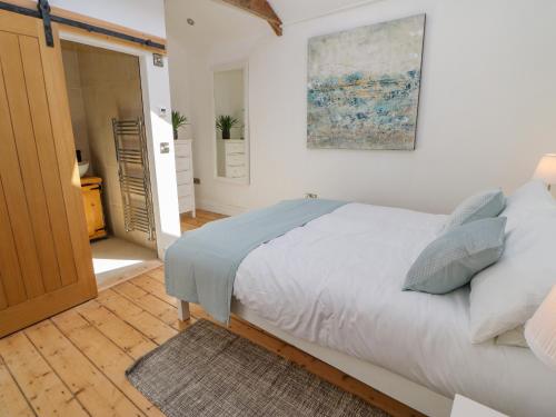 Postel nebo postele na pokoji v ubytování Bramwell House