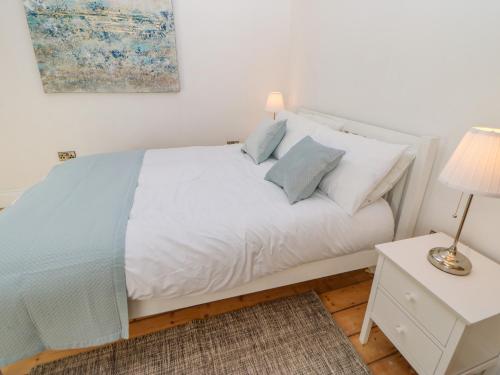 Postel nebo postele na pokoji v ubytování Bramwell House