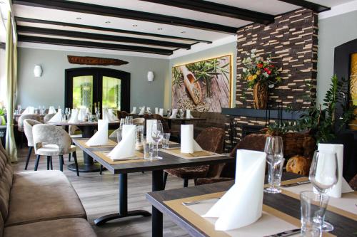 Restoranas ar kita vieta pavalgyti apgyvendinimo įstaigoje Forsthaus-Ferienhotel am Dobrock