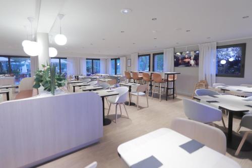 Restoran atau tempat lain untuk makan di Hôtel Antares & Spa