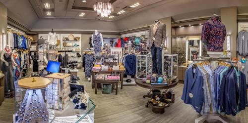 a store with a lot of clothes on display at Rosen Shingle Creek Universal Blvd in Orlando