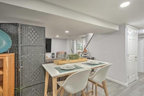 a kitchen and dining room with a table and chairs at Saddle Brook Studio with Patio - Near NYC! in Saddle Brook