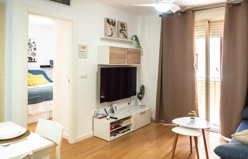 Televisyen dan/atau pusat hiburan di Apartamento Buen Camino