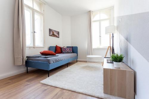 Posezení v ubytování FULL HOUSE Studios - Das Beschickbare Apartment