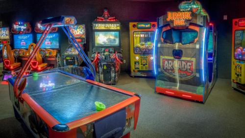 a group of arcade games in a room at Rosen Shingle Creek Universal Blvd in Orlando