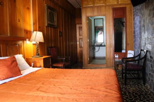 Una cama o camas en una habitación de Hotel Vitorina