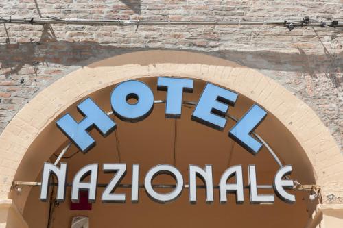a sign for a metro marriott sign on a building at Hotel Nazionale in Ferrara