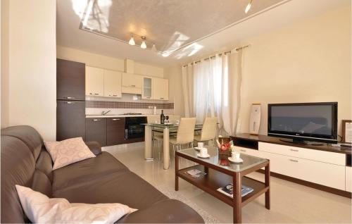 Kuchyň nebo kuchyňský kout v ubytování Apartment Posedarje 32