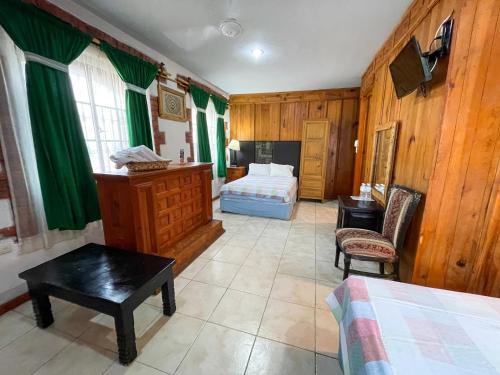 Una cama o camas en una habitación de Hotel Vitorina