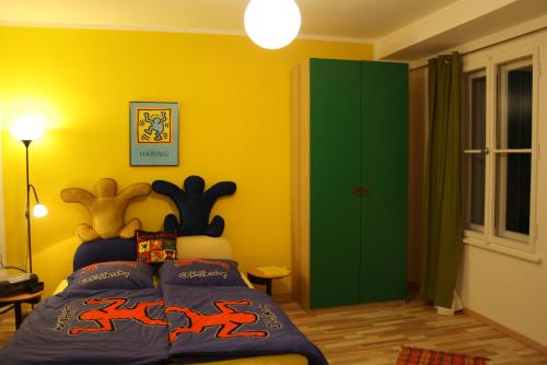 Cama o camas de una habitación en Apartments Villa del Arte