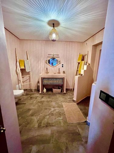 Un ou plusieurs lits dans un hébergement de l'établissement Riad Dar Chadia