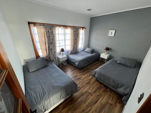 Postel nebo postele na pokoji v ubytování Hostal FloryMar