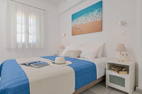 Postel nebo postele na pokoji v ubytování Naxos Affinity Villas