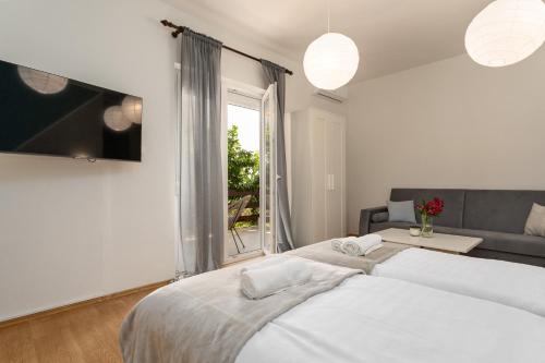 Posteľ alebo postele v izbe v ubytovaní Apartment Fiorella