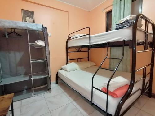 Postel nebo postele na pokoji v ubytování Marta's Guesthouses, apartamentos con entrada autonoma