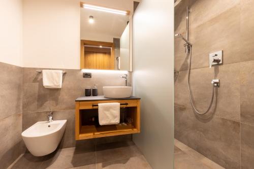 Koupelna v ubytování Hotel Piccolo