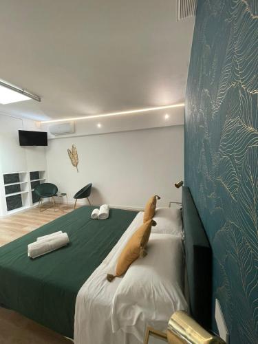 Postel nebo postele na pokoji v ubytování Maison Aida