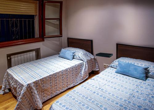 Postel nebo postele na pokoji v ubytování Apartamento Rústico en Ojén