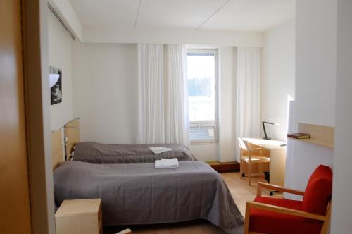 Giường trong phòng chung tại Hotel Norrvalla