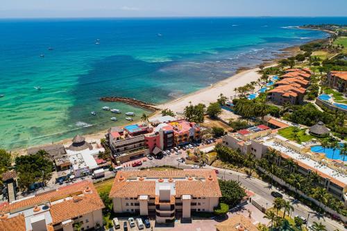 an aerial view of a resort and the beach at Anclote 5103 in Punta Mita