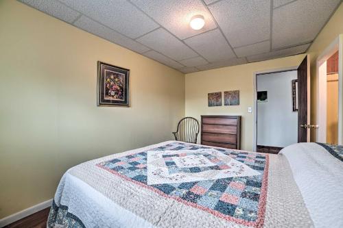 Una cama o camas en una habitación de Walkable St Ignace Condo with Lake Huron Views