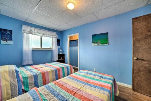Una cama o camas en una habitación de Walkable St Ignace Condo with Lake Huron Views