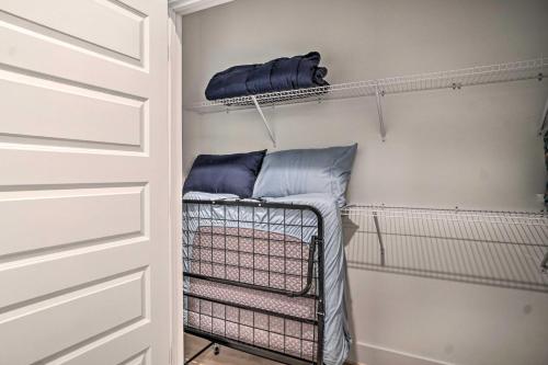 a walk in closet with a bed in it at Hot Tub and EV Charger Helen Getaway with Views! in Helen