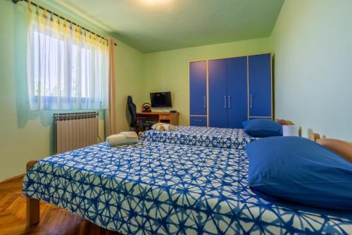 Posteľ alebo postele v izbe v ubytovaní House Forest Paradise