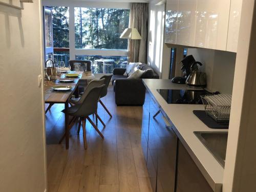 Appartement rénové au calme avec balcon et parking