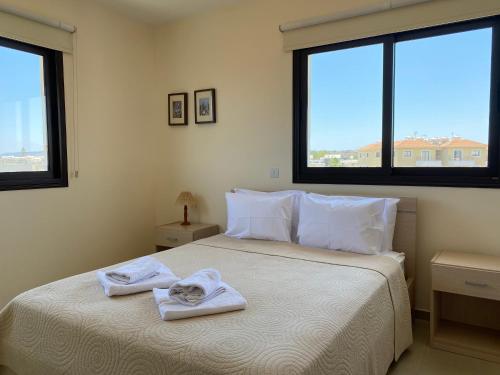 Säng eller sängar i ett rum på Kyklades Resort & Spa