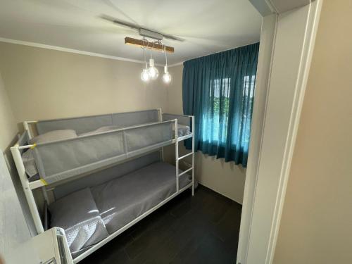 Ένα ή περισσότερα κρεβάτια σε δωμάτιο στο Villa Marisa Resort
